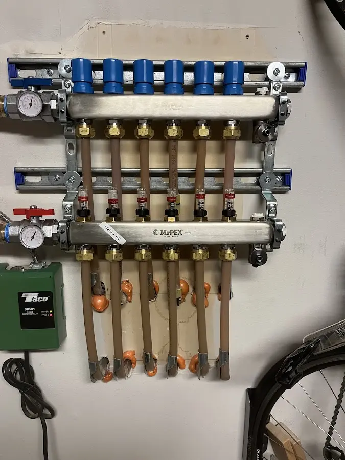 Plumber performing Leak Detection at a residential property in Comstock